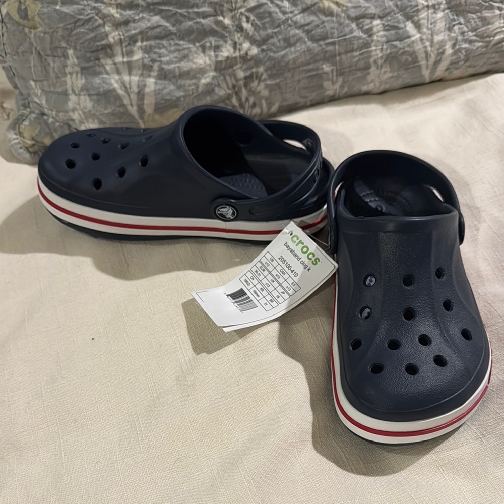 Kids size 13 Crocs Navy, White, and Red stripe